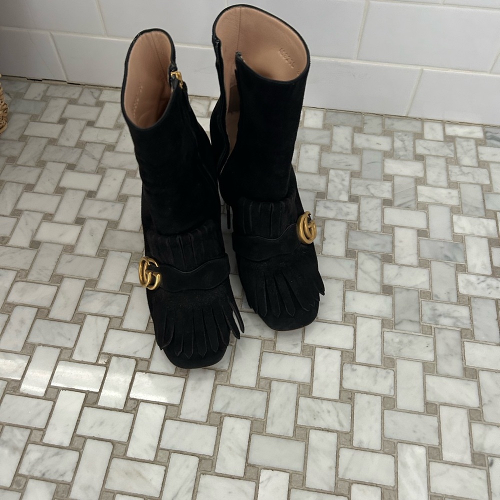 Gucci suede boots with fringe.  Excellent condition size 38.